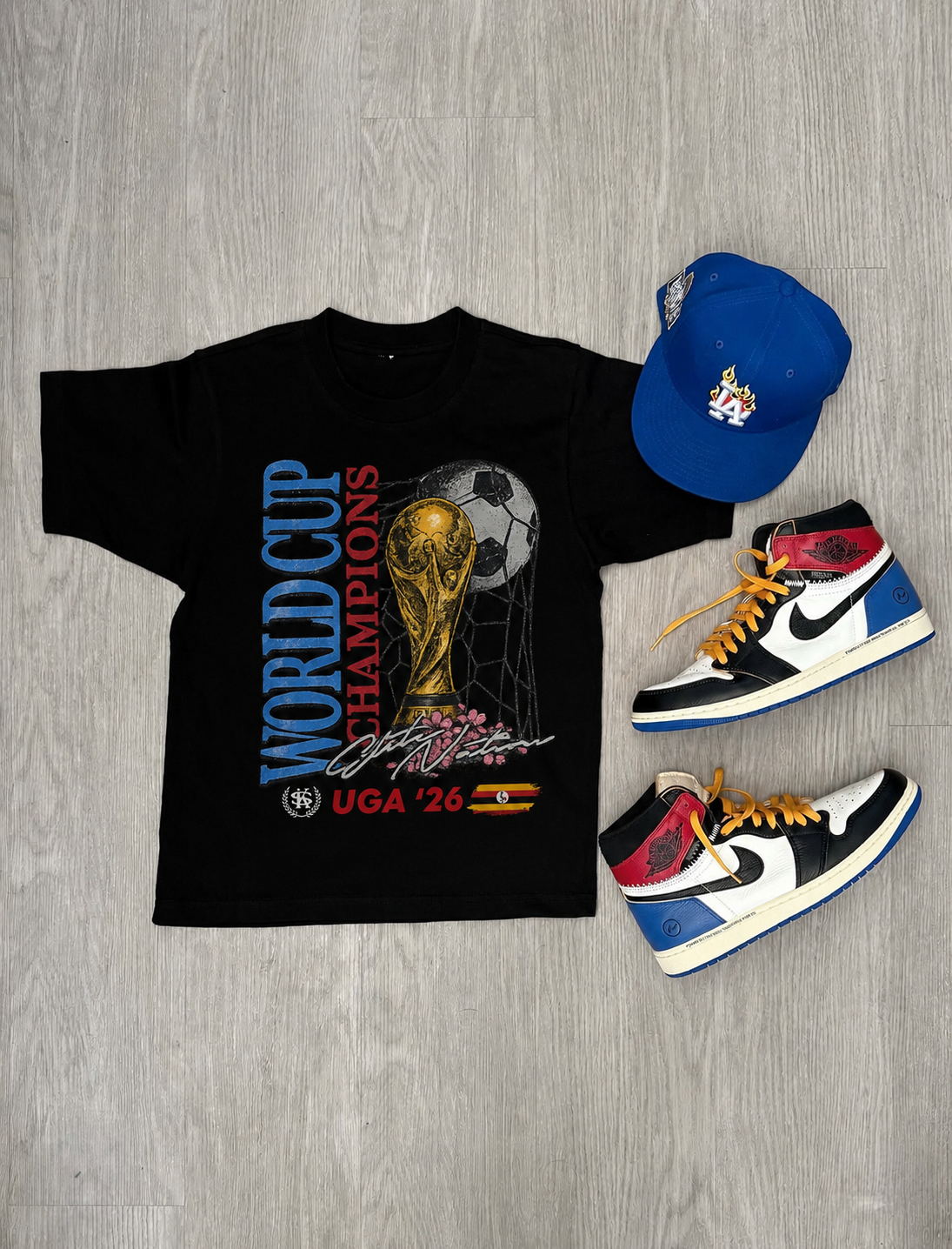 #🌞🇺🇬 ‘26 World Cup Champions Tee